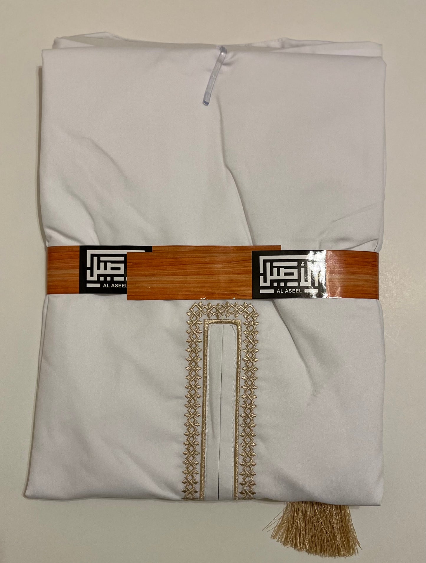 Al Aseel White Omani Thobe with Gold Embroidery & Tassel – Multiple Sizes
