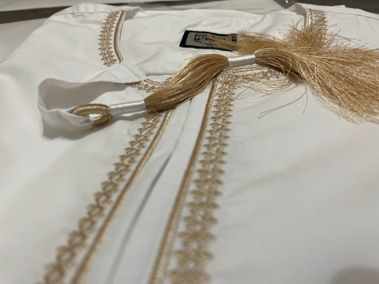 Al Aseel White Omani Thobe with Gold Embroidery & Tassel – Multiple Sizes